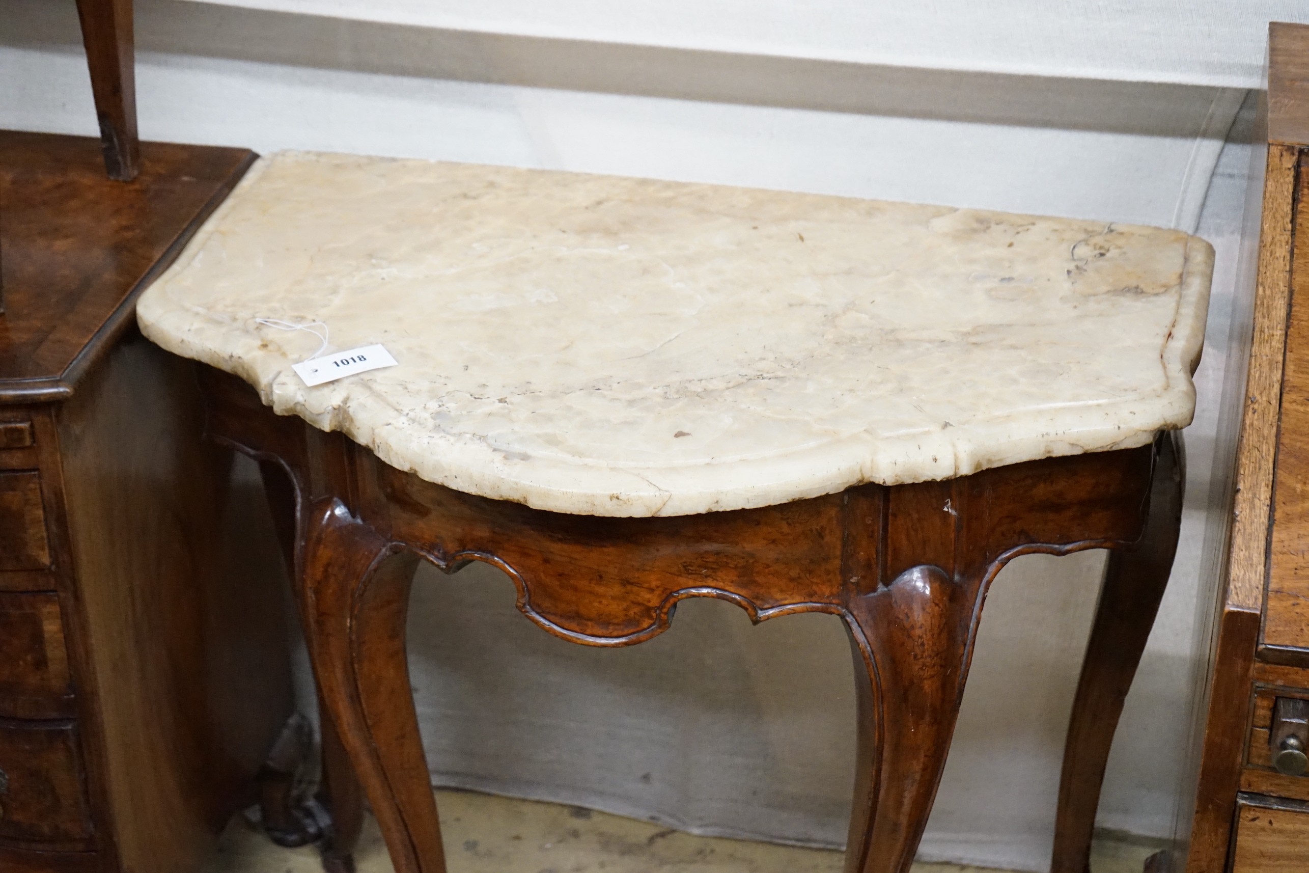 A 19th century and later French marble top walnut console table, width 81cm, depth 47cm, height 78cm